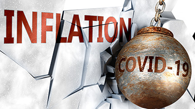 wrecking ball with inflation and covid-19 words on image